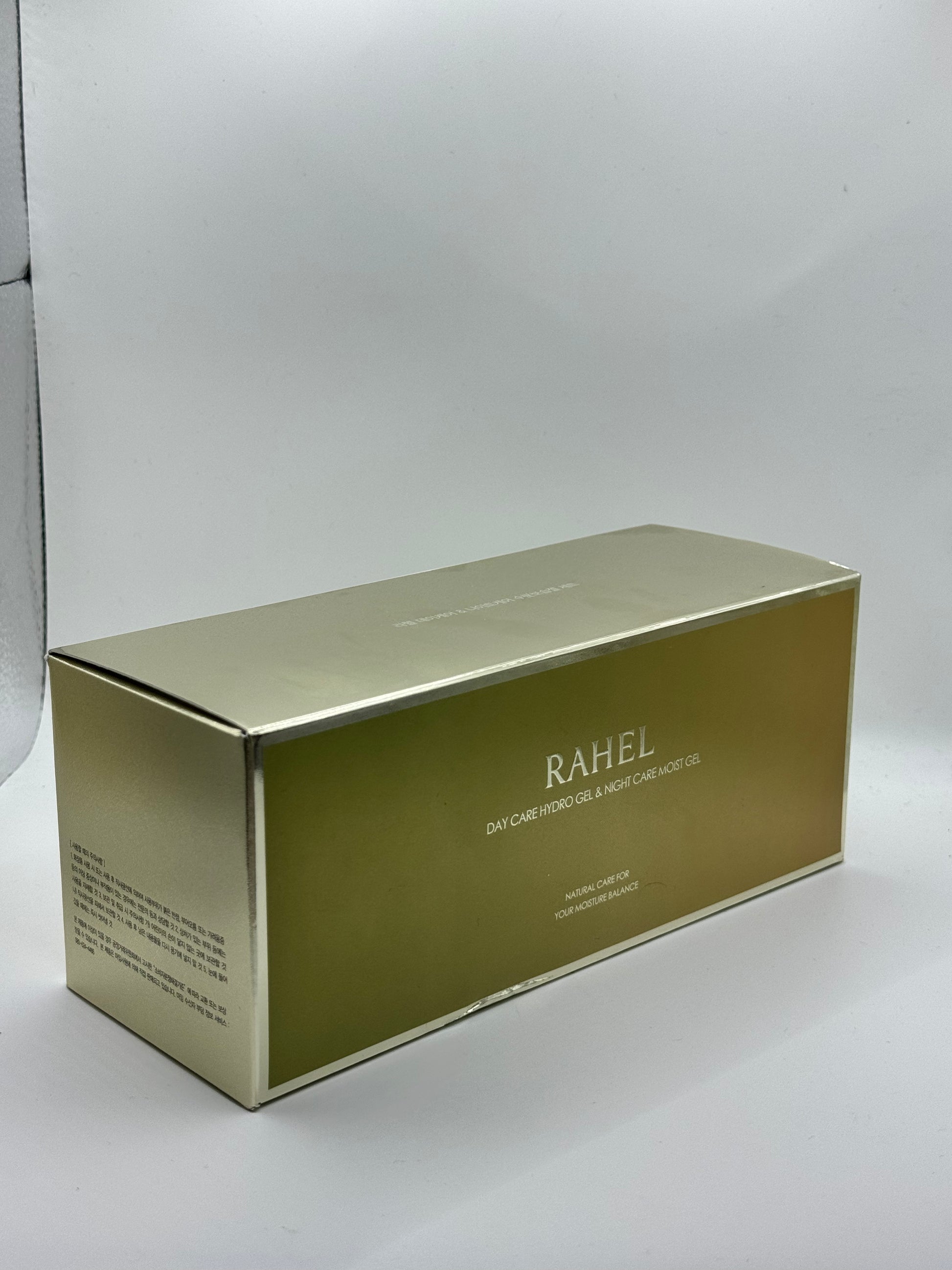 Gold box with 'RAHEL' branding on a white background